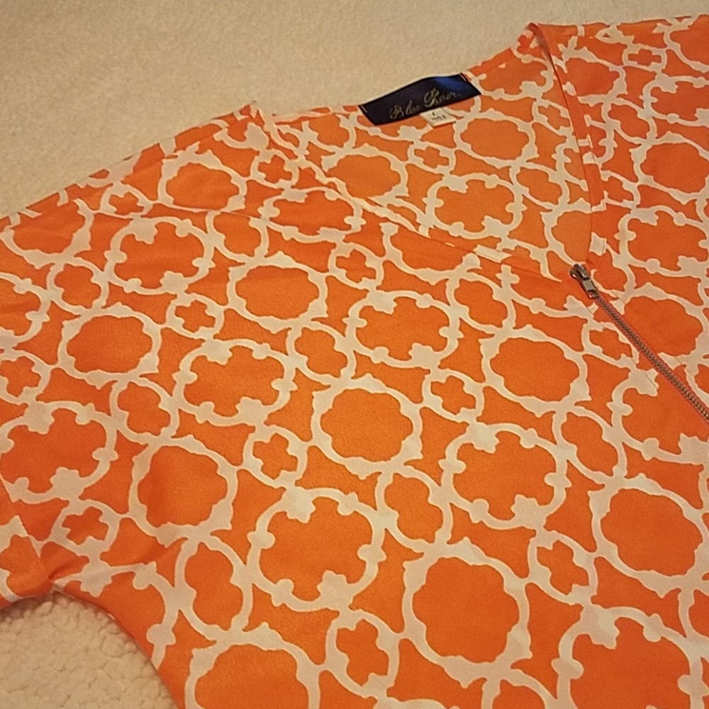 Blue Rain orange/white top